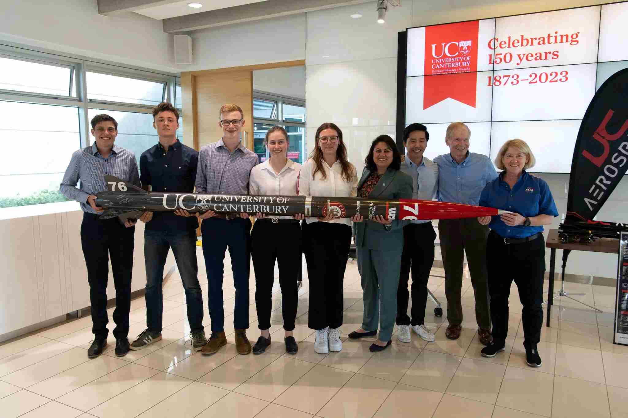 Rocket next to NASA administrator Bill Nelson